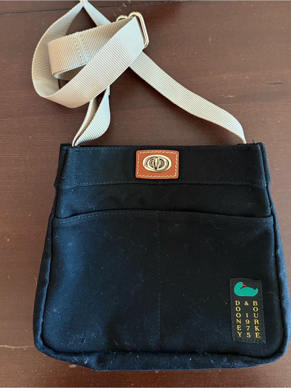 Dooney & Bourke Canvas Crossbody 24 Black Bag with Cream Strap